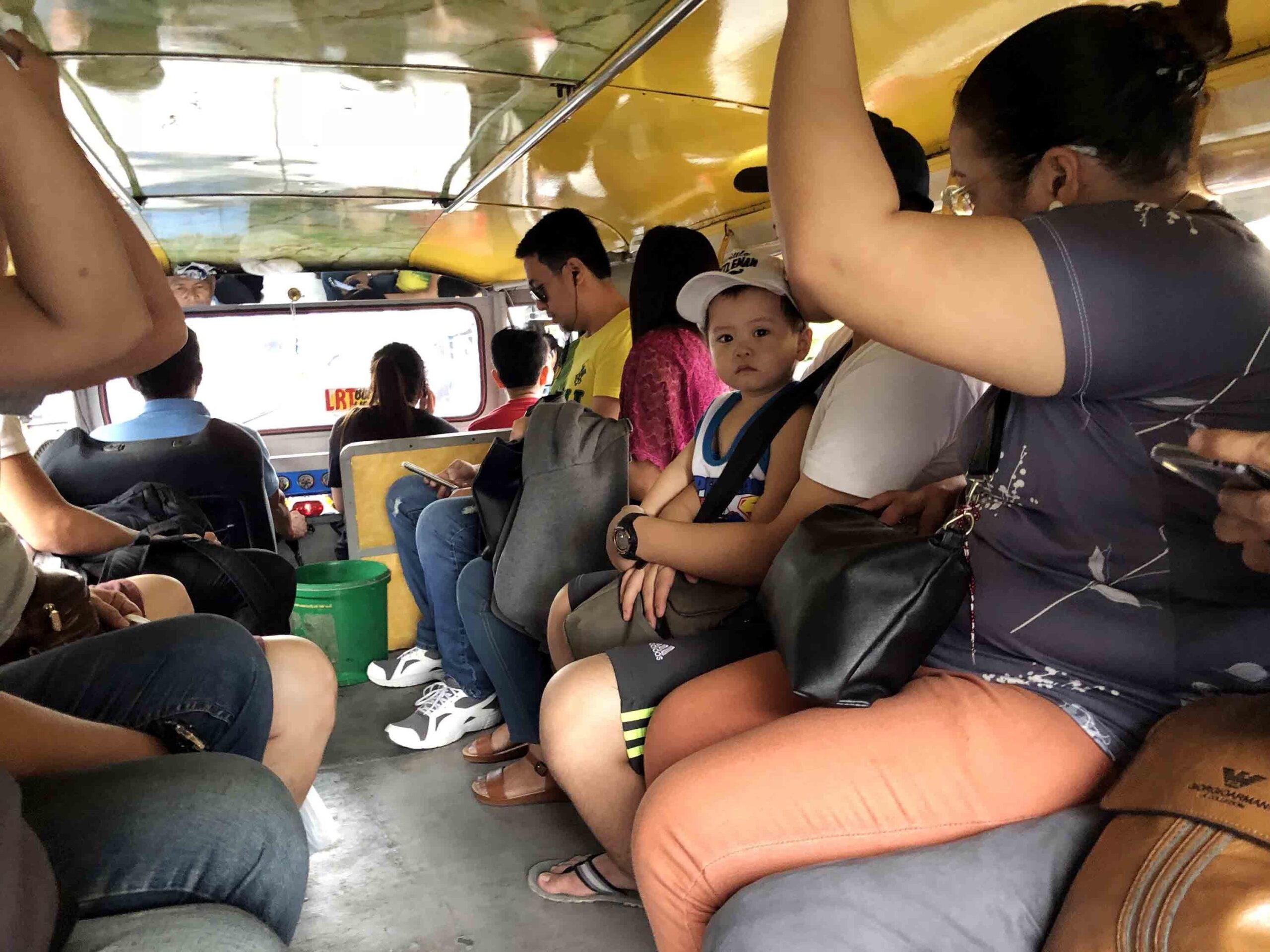 Commuters passing fare forward